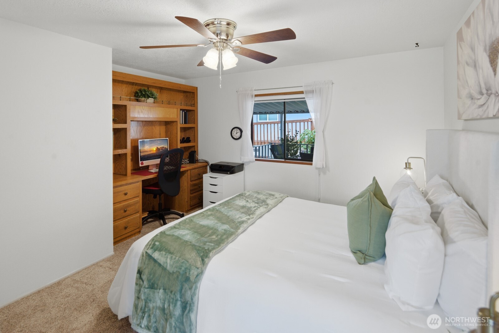 1427 100th Street Southwest, Unit 149 Everett, WA 98204 - Photo 24 of 40 a bedroom with a bed dresser and a window
