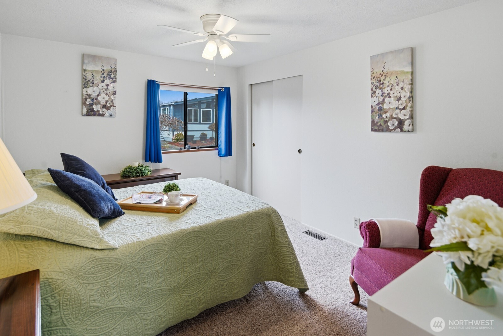 1427 100th Street Southwest, Unit 149 Everett, WA 98204 - Photo 25 of 40 a bedroom with furniture and wooden floor