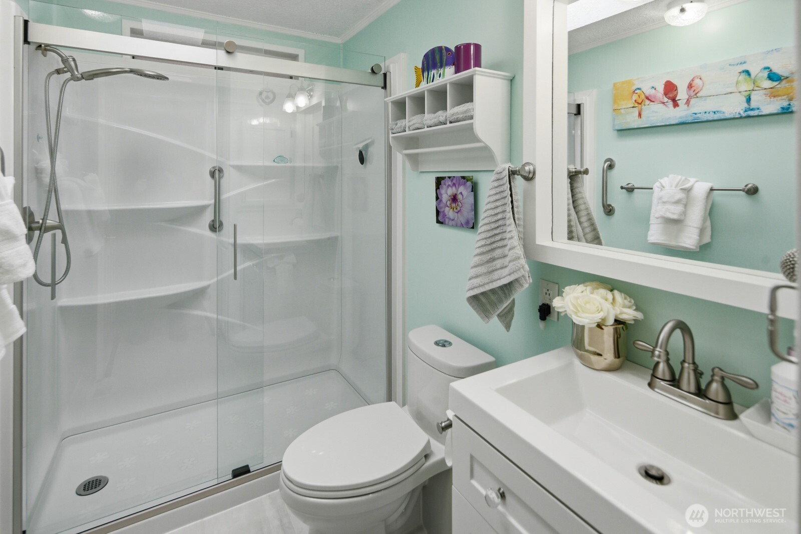 1427 100th Street Southwest, Unit 149 Everett, WA 98204 - Photo 26 of 40 a bathroom with a sink a toilet and shower