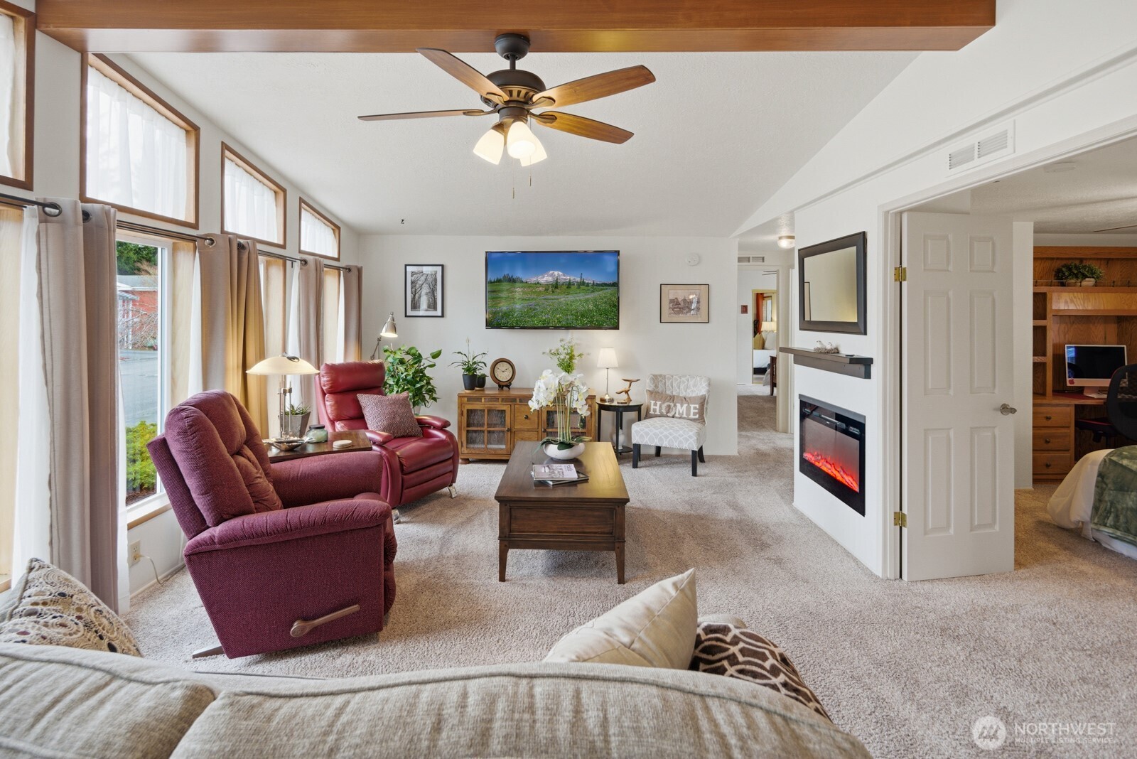 1427 100th Street Southwest, Unit 149 Everett, WA 98204 - Photo 5 of 40 a living room with furniture ceiling fan and a window