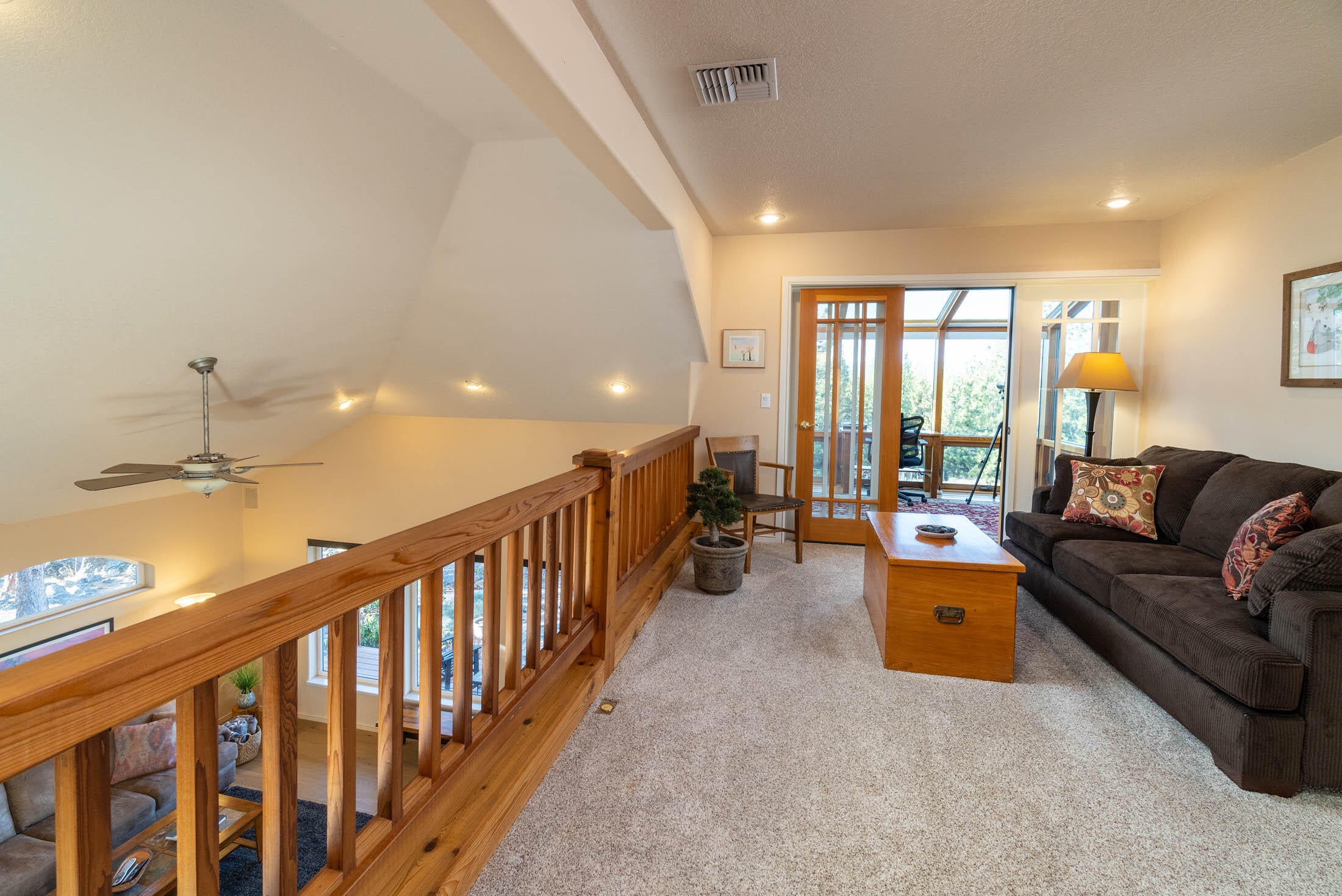 60205 Crater Road Bend, OR 97702 - Photo 28 of 74 Second level loft area. Office/flex space is straight ahead. Master bedroom, bathroom and walk-in closet are to the right in this photo.
