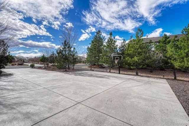 a view of backyard with green space