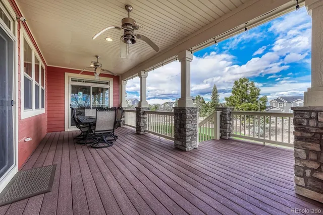 a view of living room with furniture and wooden floor