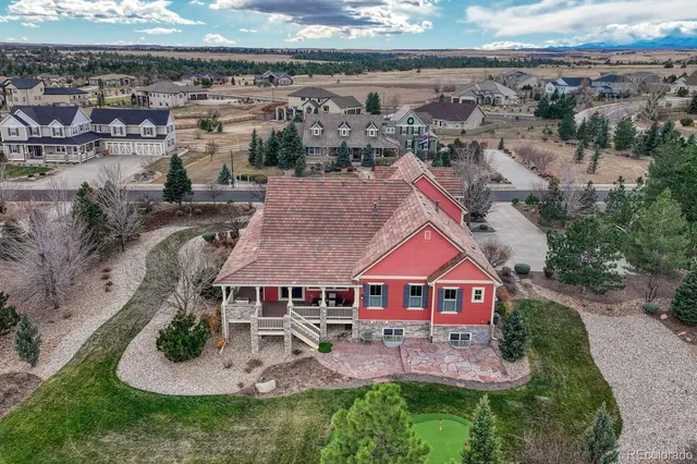 an aerial view of a house with garden