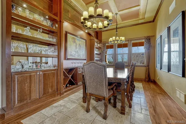 a view of a dining room with furniture window and chandelier