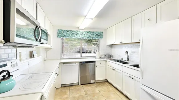 $425,000 | 1300 North Portofino Drive, Unit S206, Sarasota, FL 34242