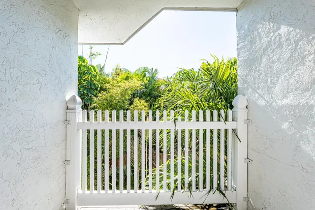 a view of a wooden fence