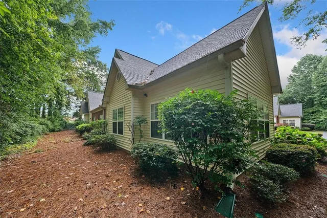 a view of swimming pool with lounge chair