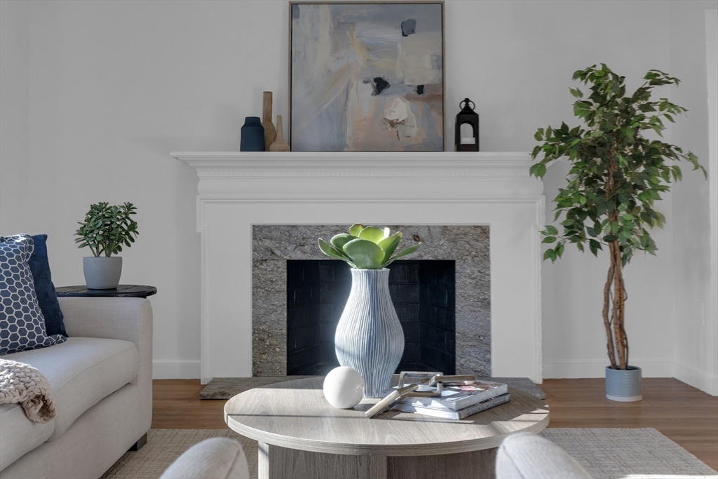 67 Cushing Road Westwood, MA 02090 - Photo 15 of 41 a living room with furniture and a fireplace