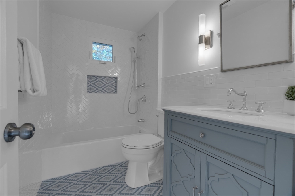 67 Cushing Road Westwood, MA 02090 - Photo 20 of 41 a bathroom with a sink a toilet and shower