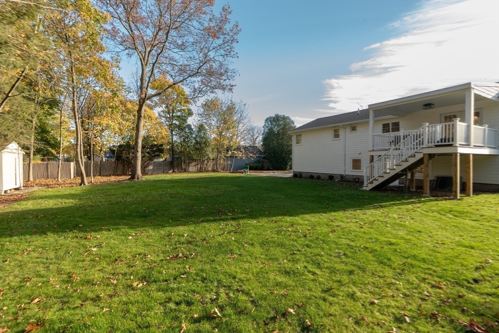 67 Cushing Road Westwood, MA 02090 - Photo 40 of 41 a view of a house with a big yard