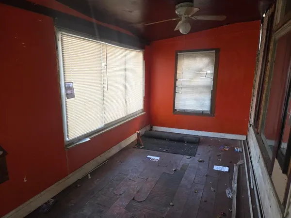 an empty room with windows