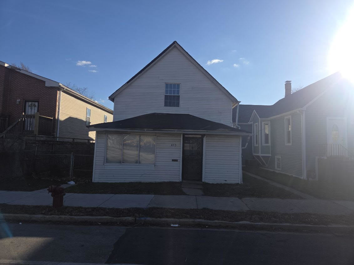 433 West 103rd Street Chicago, IL 60628 - Photo 2 of 11 a view of backyard of house