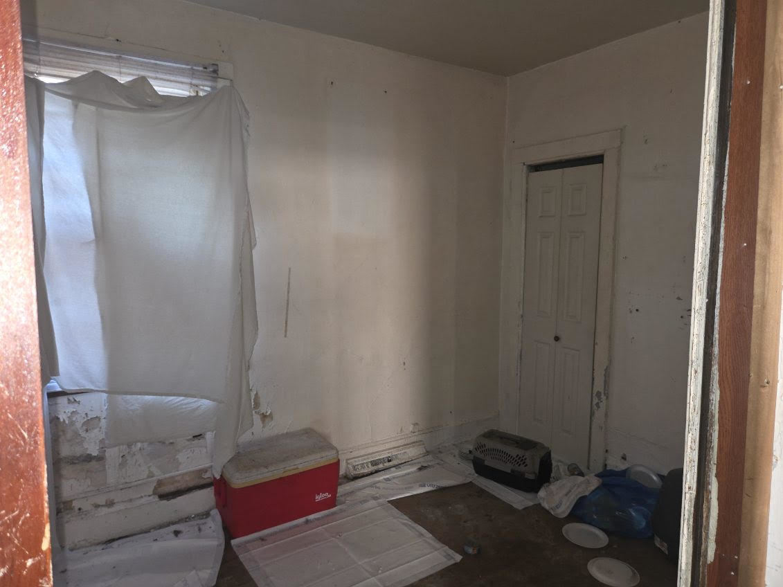 433 West 103rd Street Chicago, IL 60628 - Photo 8 of 11 a bathroom with a sink and a mirror