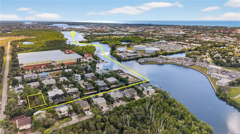 1675 Avion Place Naples, FL 34104 - Photo 12 of 18 an aerial view of ocean and residential houses with outdoor space