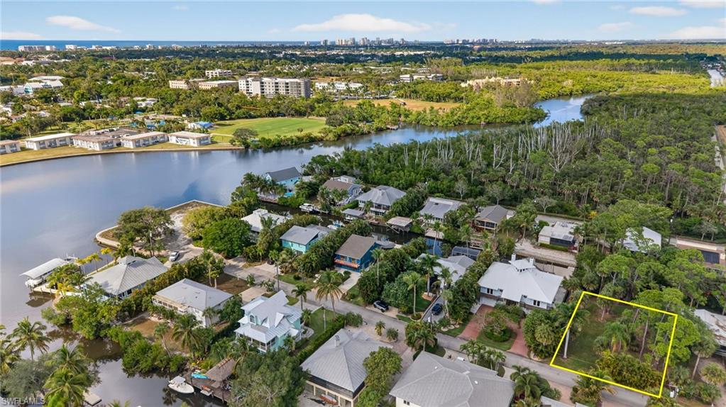 1675 Avion Place Naples, FL 34104 - Photo 19 of 21 a view of a city and ocean view