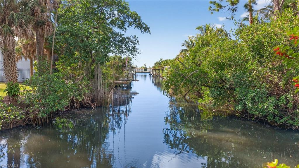 1675 Avion Place Naples, FL 34104 - Photo 2 of 16 a view of lake