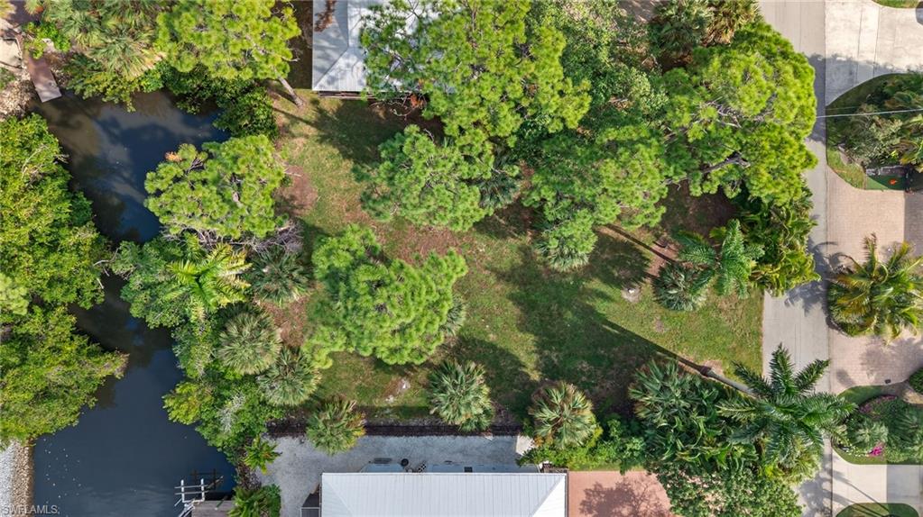 1675 Avion Place Naples, FL 34104 - Photo 7 of 21 an aerial view of a house with a yard