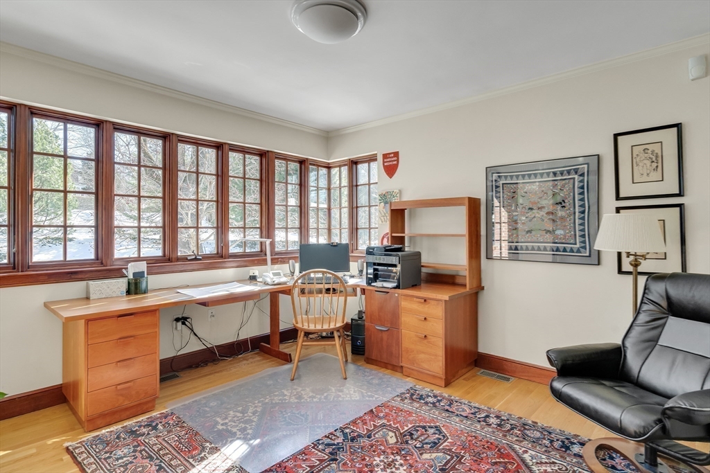48 Avondale Road Newton, MA 02459 - Photo 13 of 37 a view of a workspace with furniture and a window