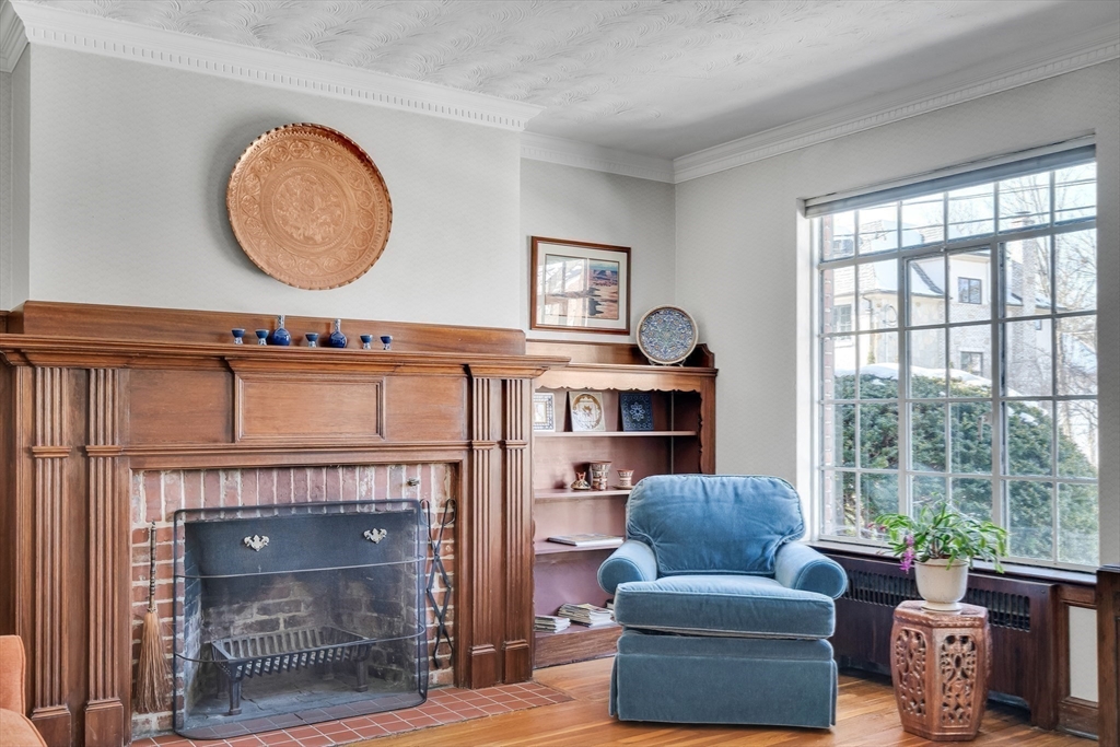 48 Avondale Road Newton, MA 02459 - Photo 22 of 37 a living room with furniture and a fireplace