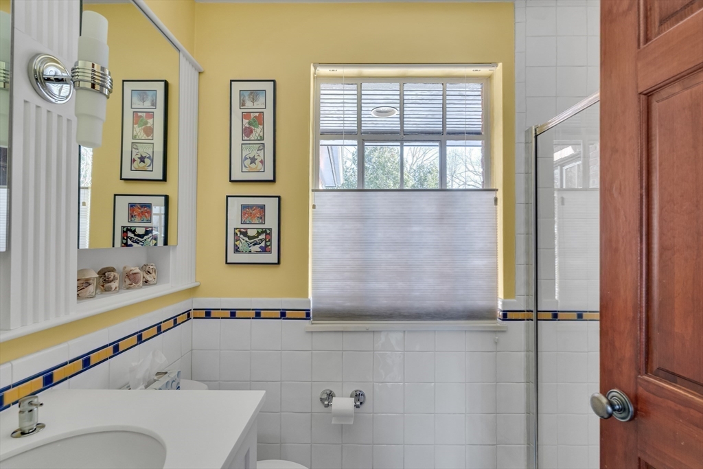 48 Avondale Road Newton, MA 02459 - Photo 26 of 37 a bathroom with a bathtub and shower