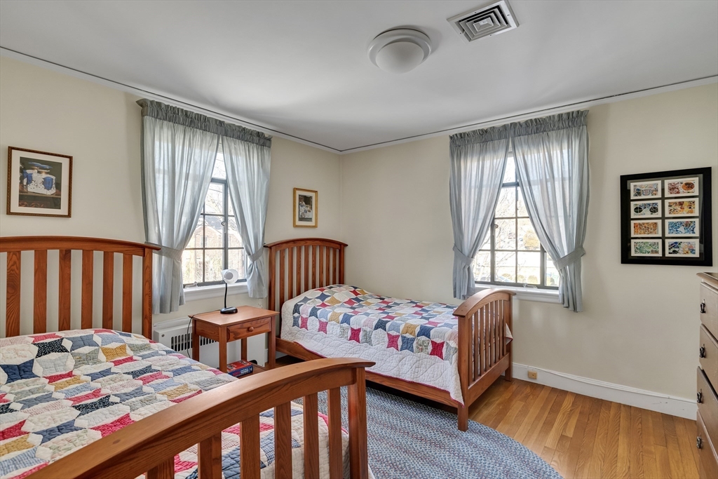 48 Avondale Road Newton, MA 02459 - Photo 30 of 37 a bedroom with two beds and a window