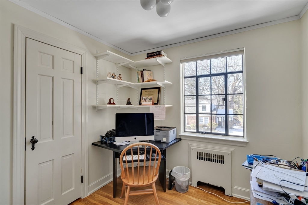 48 Avondale Road Newton, MA 02459 - Photo 31 of 37 a view of a workspace with furniture and a window