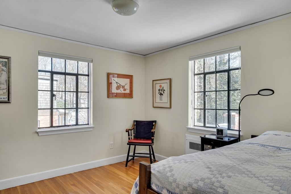 48 Avondale Road Newton, MA 02459 - Photo 32 of 37 a bedroom with a bed and a window