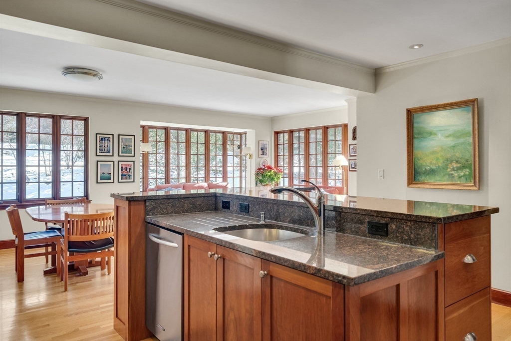 48 Avondale Road Newton, MA 02459 - Photo 6 of 37 a kitchen with granite countertop a sink and a window