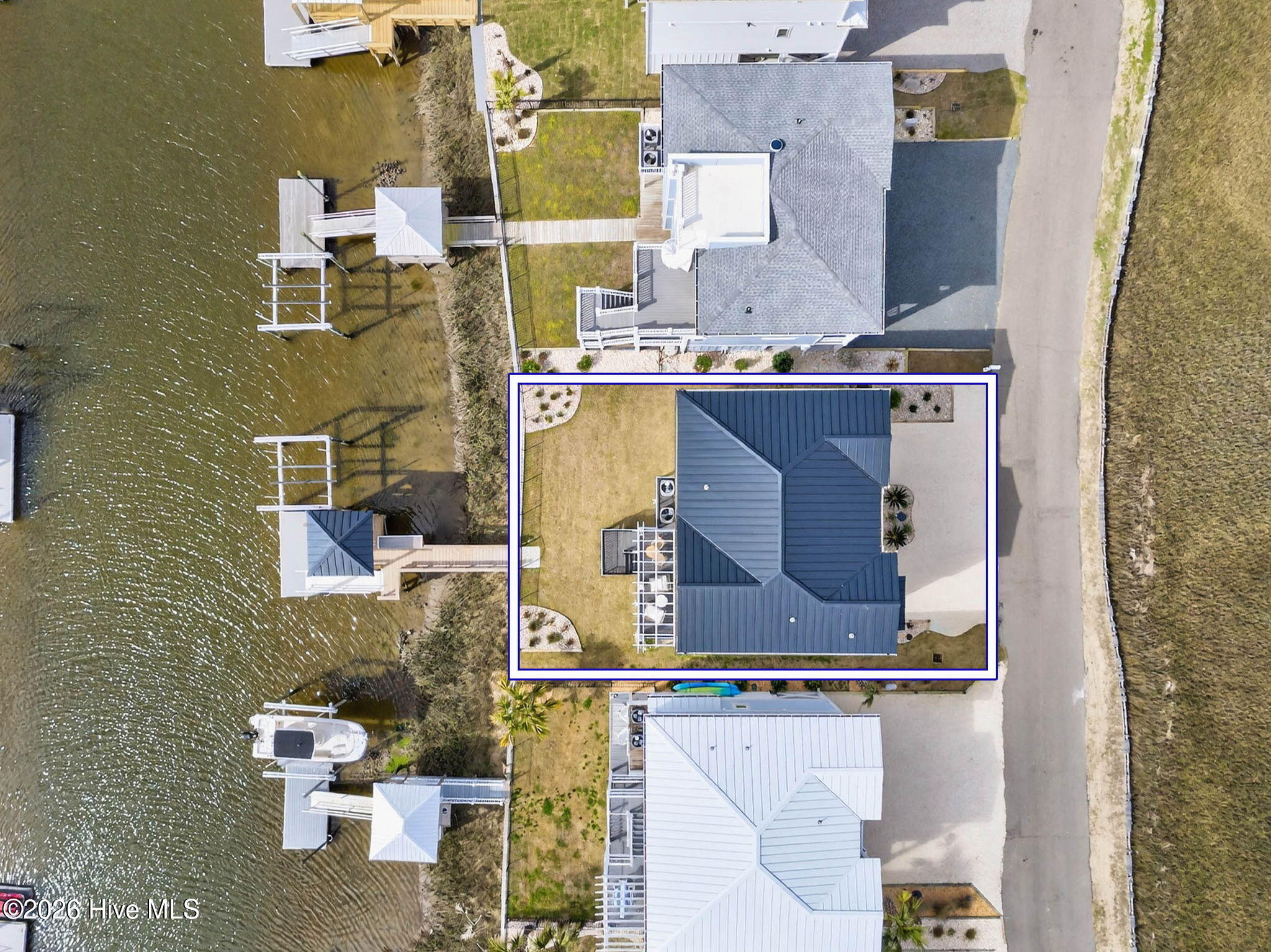 1416 Riverside Drive Sunset Beach, NC 28468 - Photo 3 of 83 Aerial view of canal-front property in Ocean Club Estates showcasing private dock, water access, and prime coastal location.