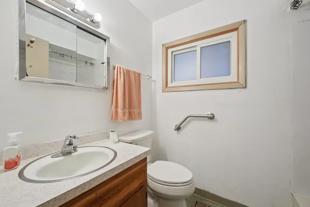 a bathroom with a sink and a toilet