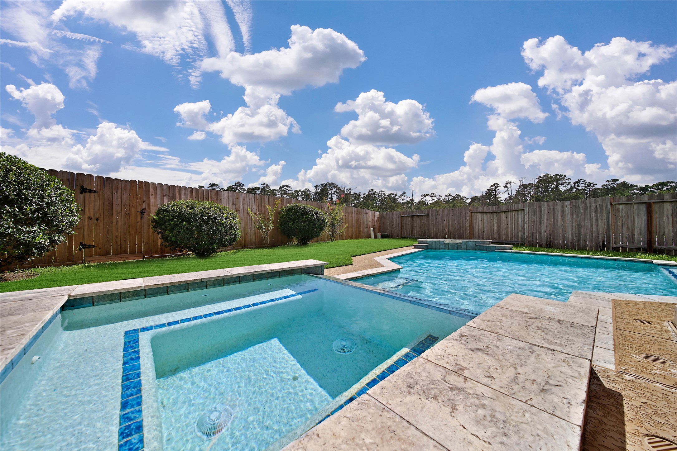 2672 Magnolia Fair Way Spring, TX 77386 - Photo 30 of 49 The attached hot tub has plenty of seating!
