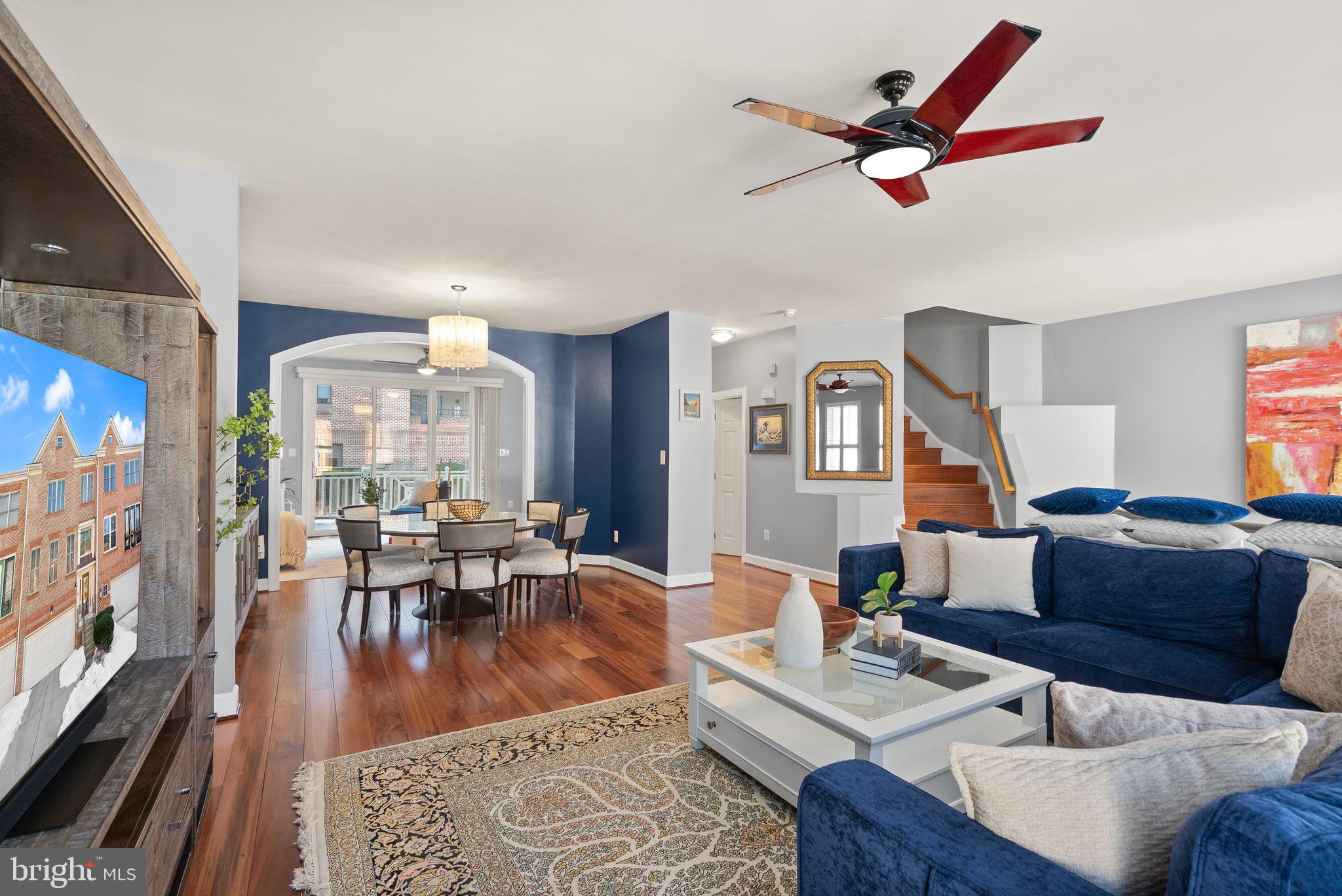 11477 Waterhaven Court Reston, VA 20190 - Photo 11 of 54 a living room with furniture and a wooden floor