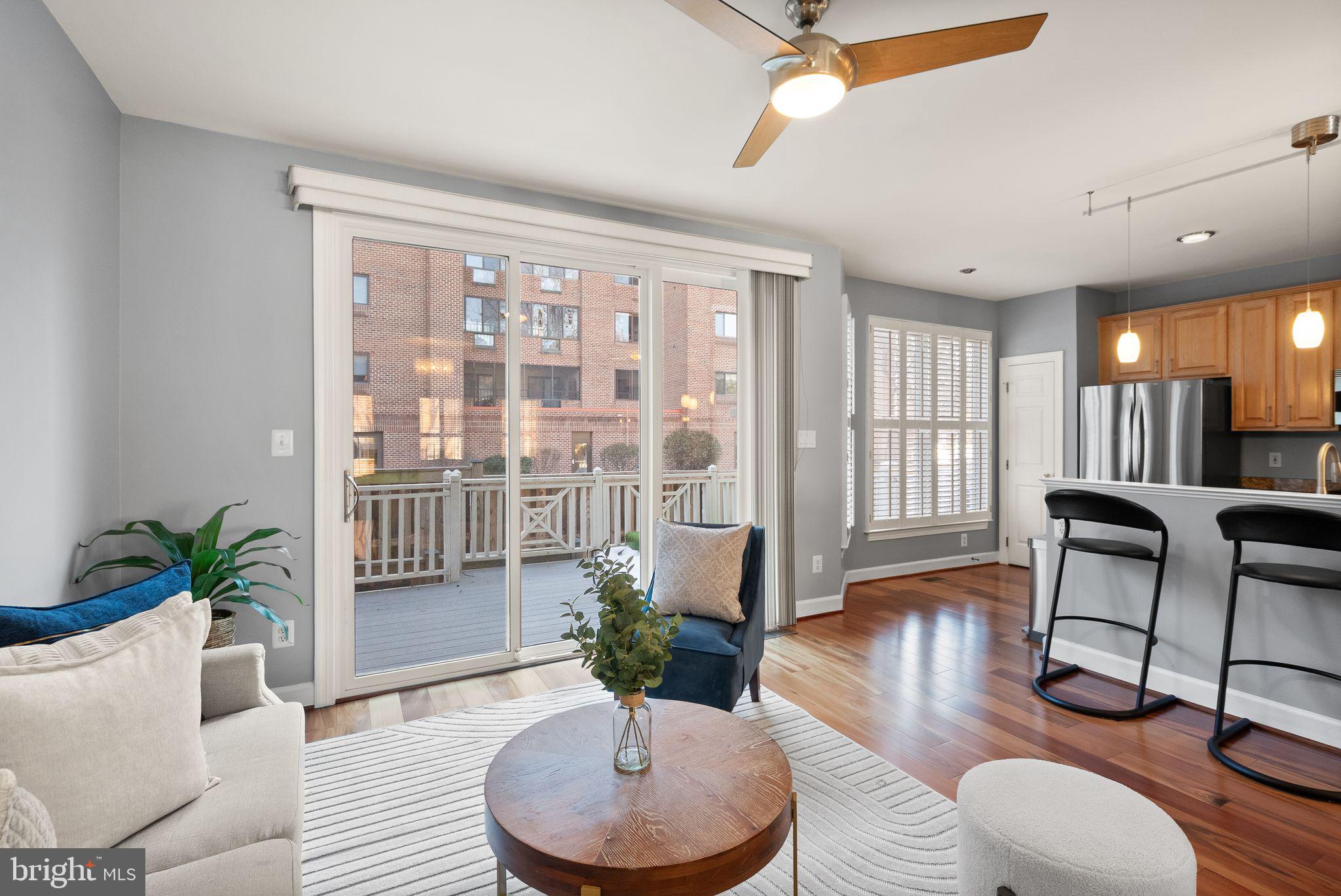 11477 Waterhaven Court Reston, VA 20190 - Photo 16 of 54 a living room with furniture and a potted plant