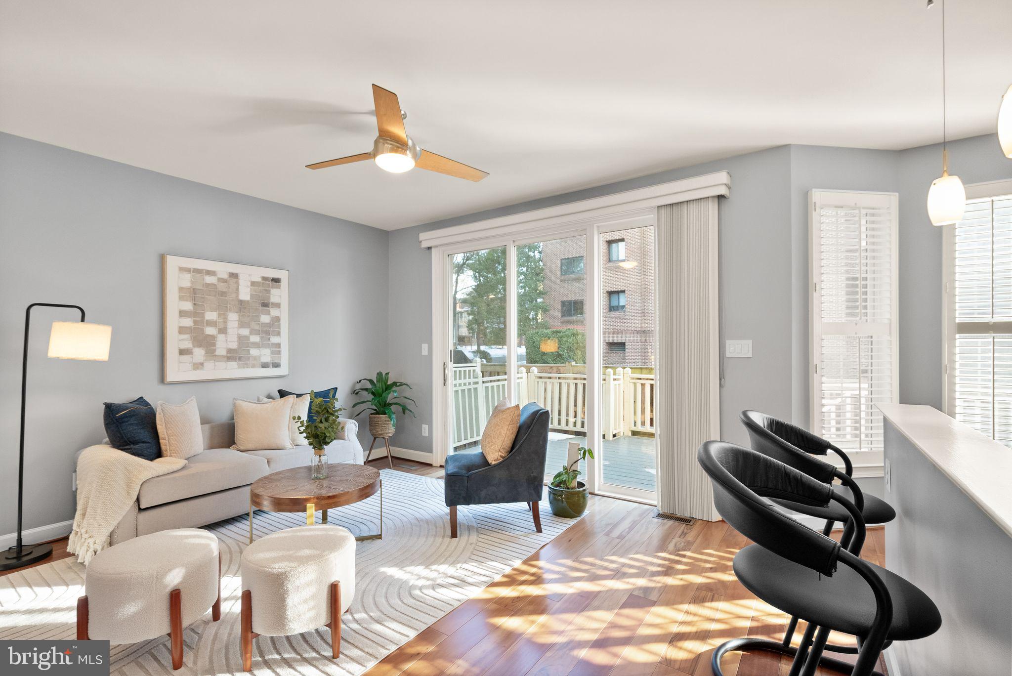 11477 Waterhaven Court Reston, VA 20190 - Photo 20 of 54 a living room with furniture rug and window
