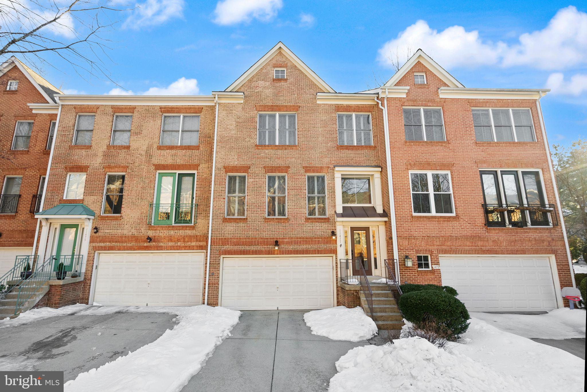 11477 Waterhaven Court Reston, VA 20190 - Photo 2 of 54 a front view of a house