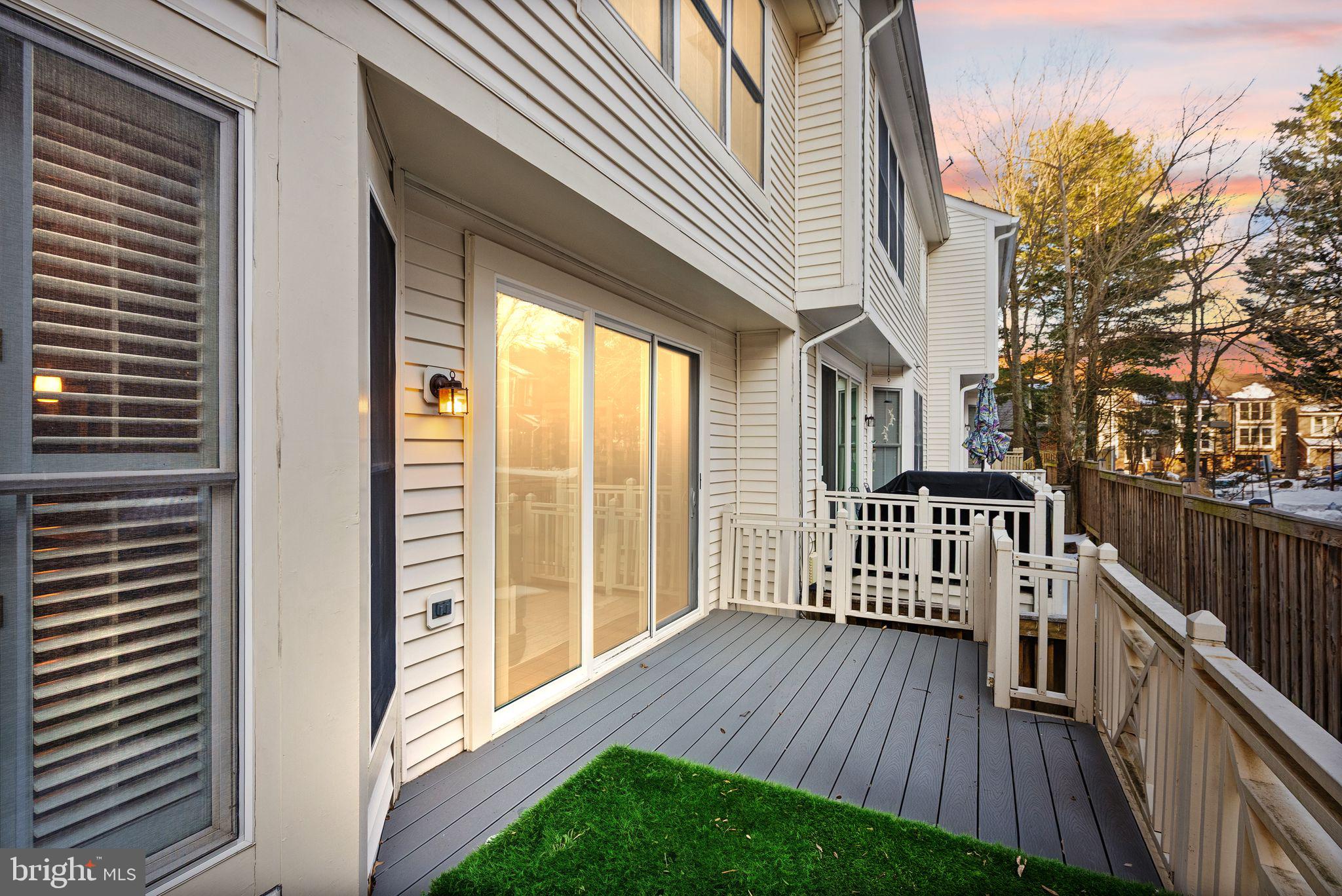 11477 Waterhaven Court Reston, VA 20190 - Photo 3 of 54 a view of a wooden deck and a yard