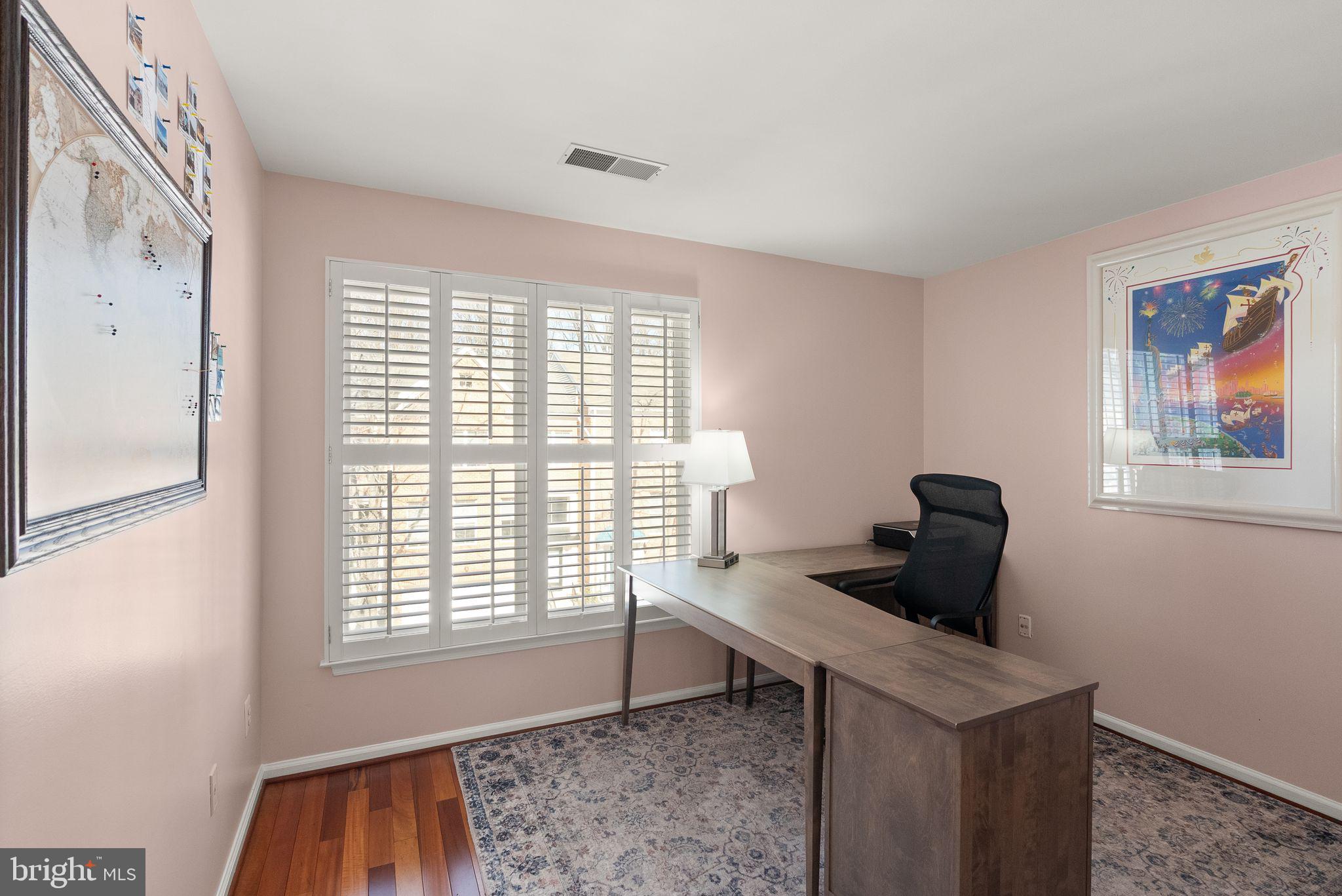 11477 Waterhaven Court Reston, VA 20190 - Photo 44 of 54 a living room with furniture and a window