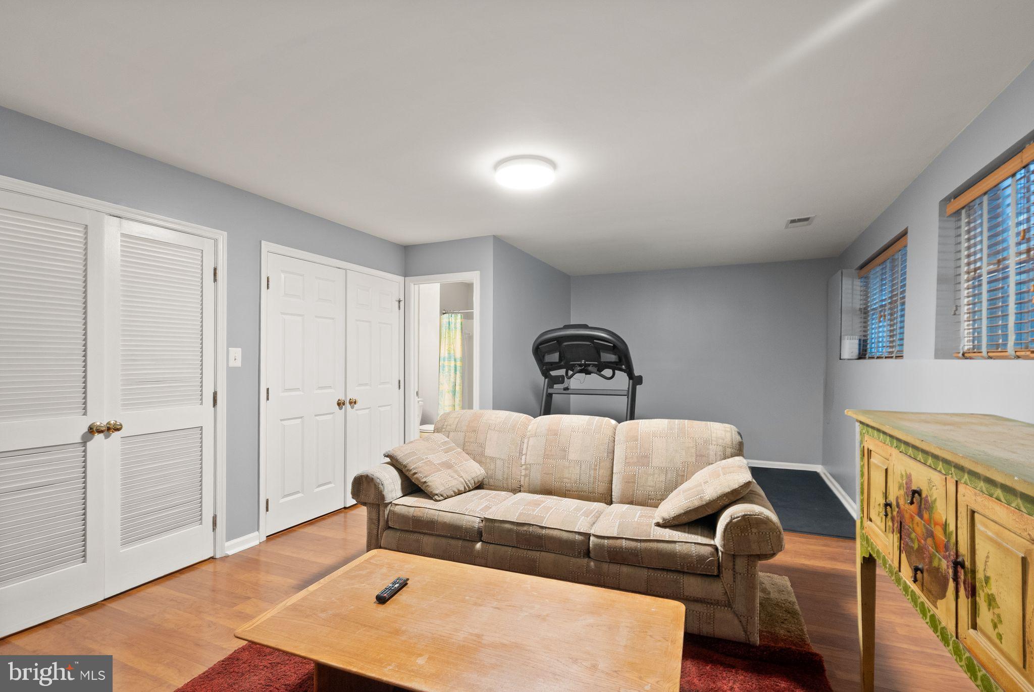 11477 Waterhaven Court Reston, VA 20190 - Photo 49 of 54 a living room with furniture and a rug