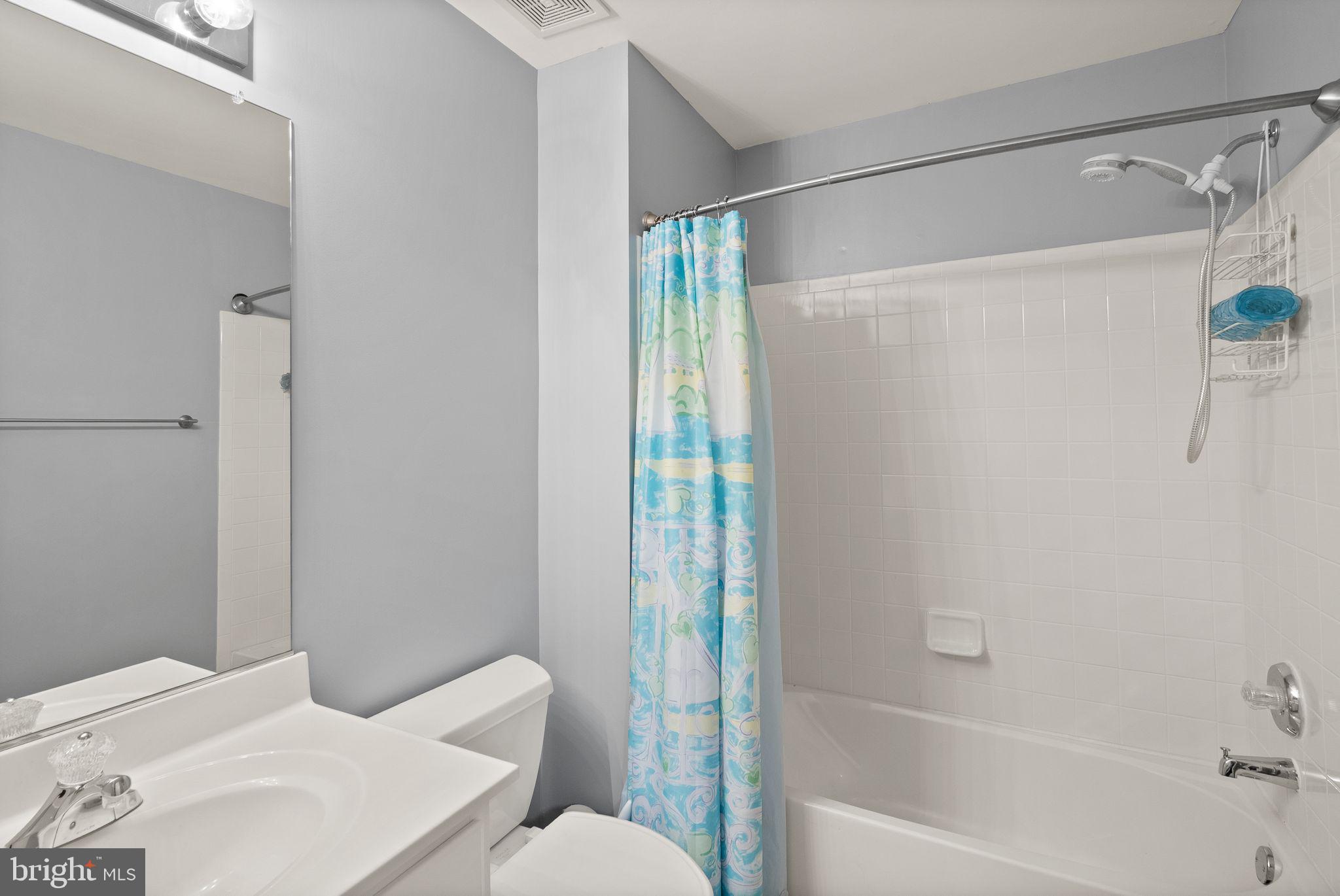 11477 Waterhaven Court Reston, VA 20190 - Photo 53 of 54 a bathroom with a shower and a toilet