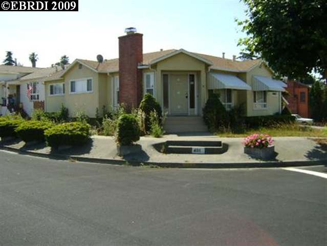 401 Napa Avenue Rodeo, CA 94572 - Photo 1 of 1 a front view of a house with a yard fire pit and outdoor seating