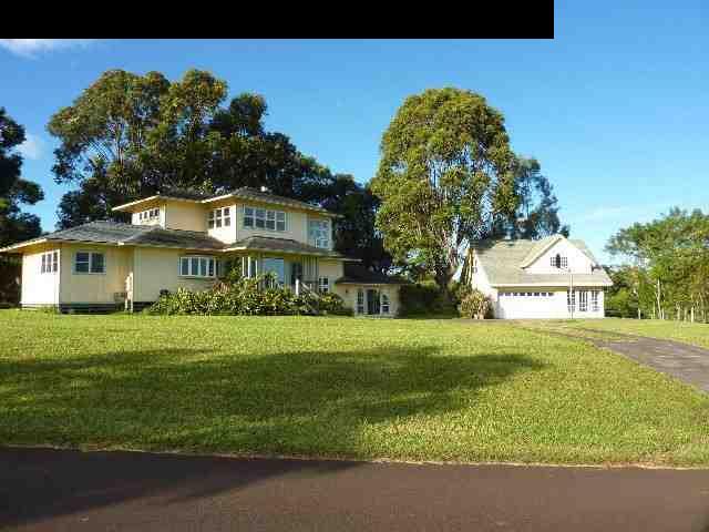 1454 Hog Back Road Haiku, HI 96708 - Photo 1 of 18 a front view of a house with a yard