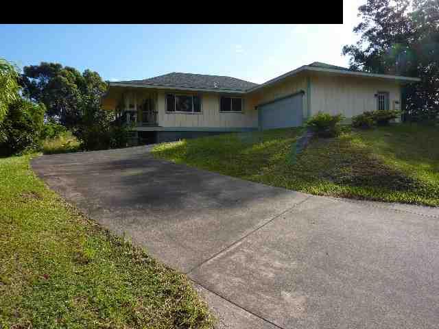 1454 Hog Back Road Haiku, HI 96708 - Photo 14 of 18 a front view of a house with garden