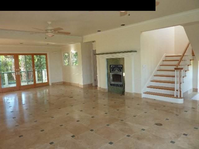 1454 Hog Back Road Haiku, HI 96708 - Photo 3 of 18 a view of an empty room with stairs