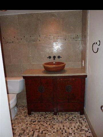 1454 Hog Back Road Haiku, HI 96708 - Photo 10 of 18 a bathroom with a sink and a toilet