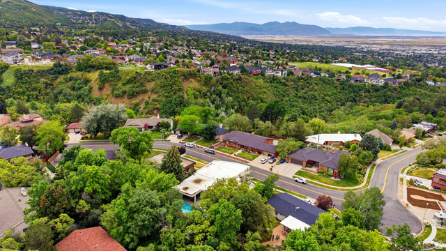 1389 Millbrook Way Bountiful, UT 84010 - Photo 72 of 74 Expansive residential area featuring numerous homes nestled among mature green trees