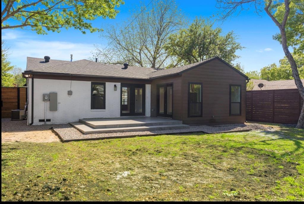4927 Linnet Lane Dallas, TX 75209 - Photo 14 of 17 a view of house with yard outdoor seating and barbeque oven
