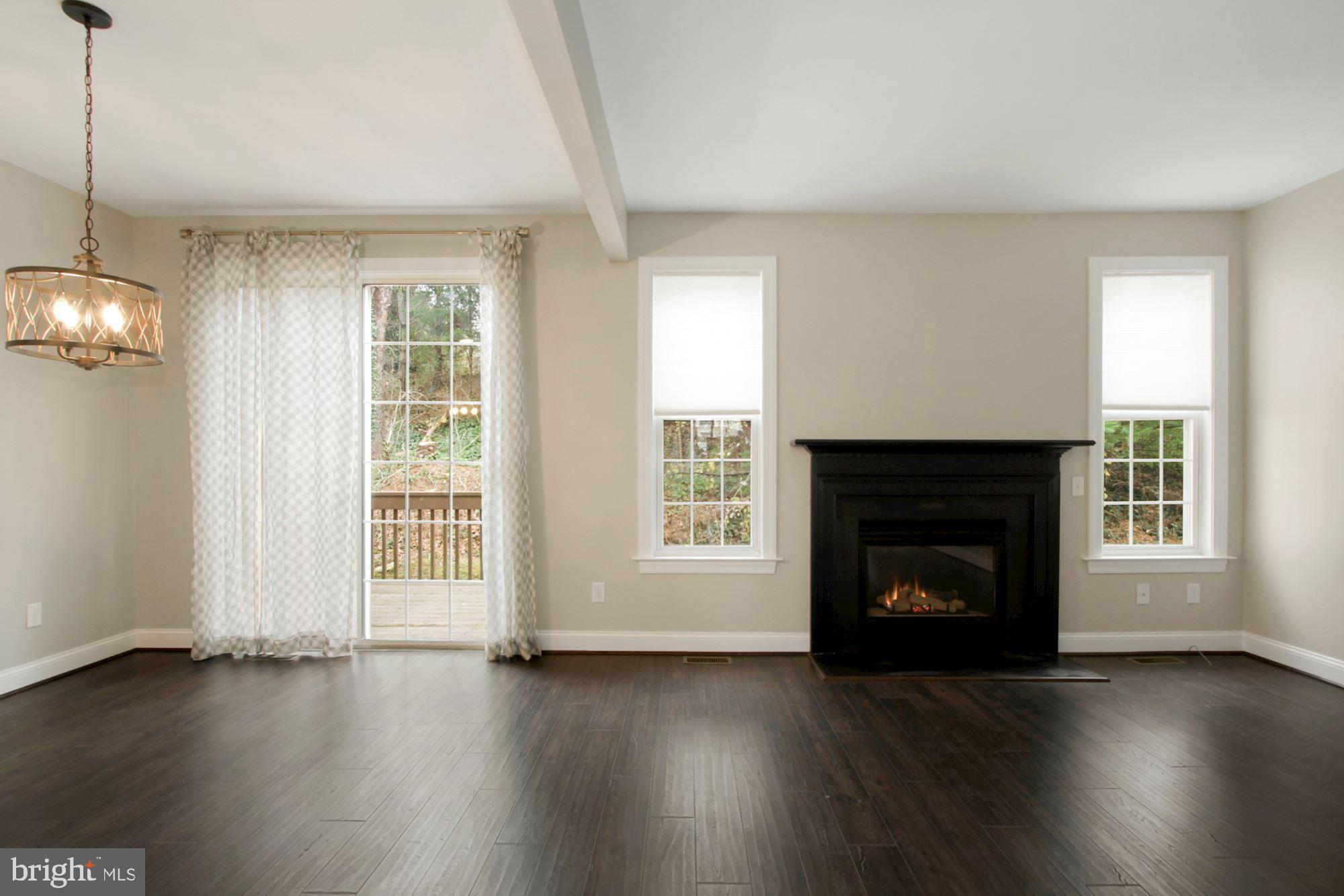 112 Federal Walk Kennett Square, PA 19348 - Photo 13 of 51 a view of an empty room with wooden floor and a window
