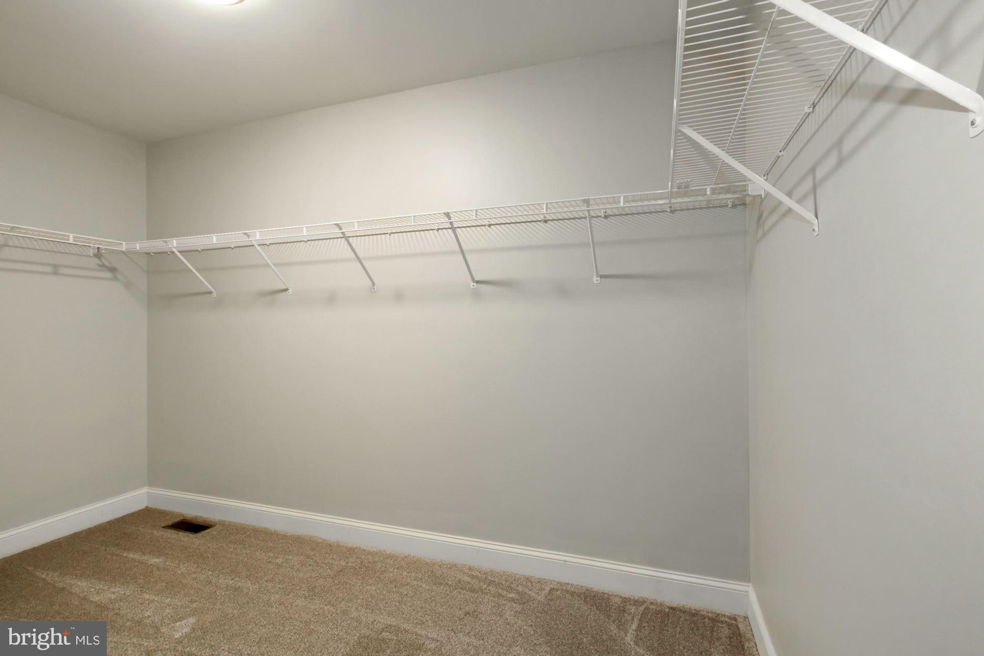 112 Federal Walk Kennett Square, PA 19348 - Photo 32 of 51 a view of a room with racks on the wall