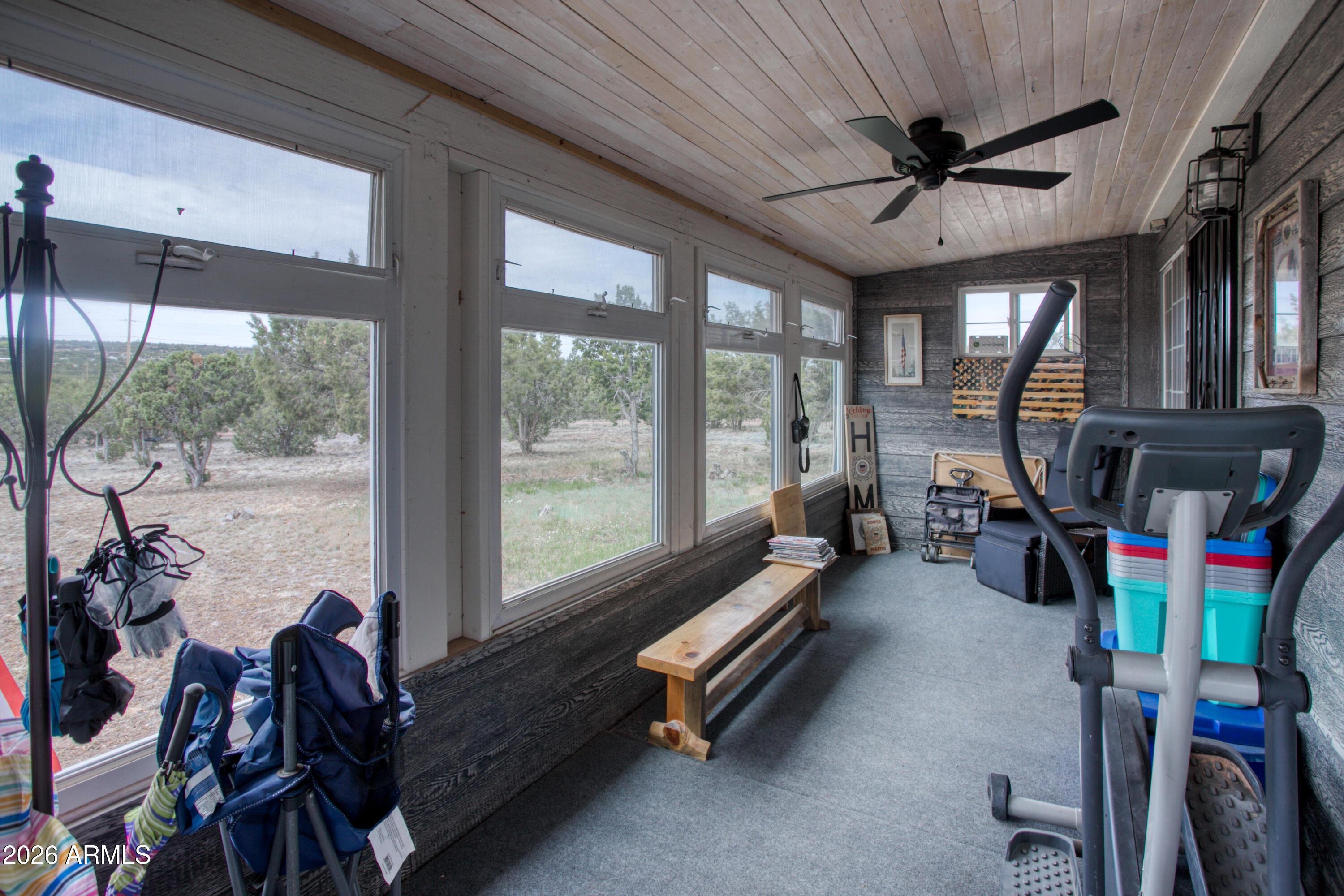 5 Co Road Show Low, AZ 85901 - Photo 5 of 39 a room with gym equipment and a large window